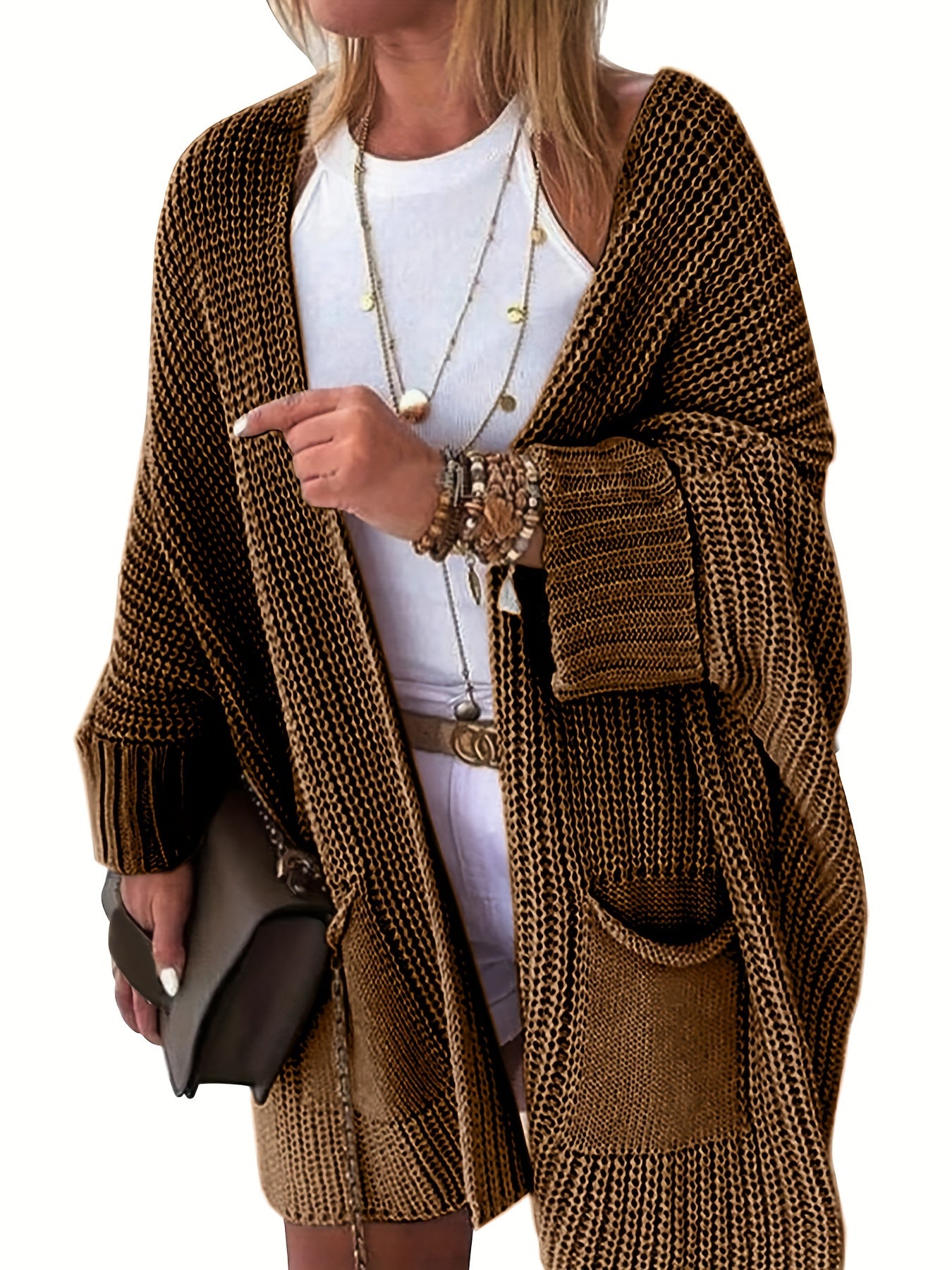 Stay warm and stylish this fall and winter with an elegant mid-length knit cardigan featuring convenient pockets.