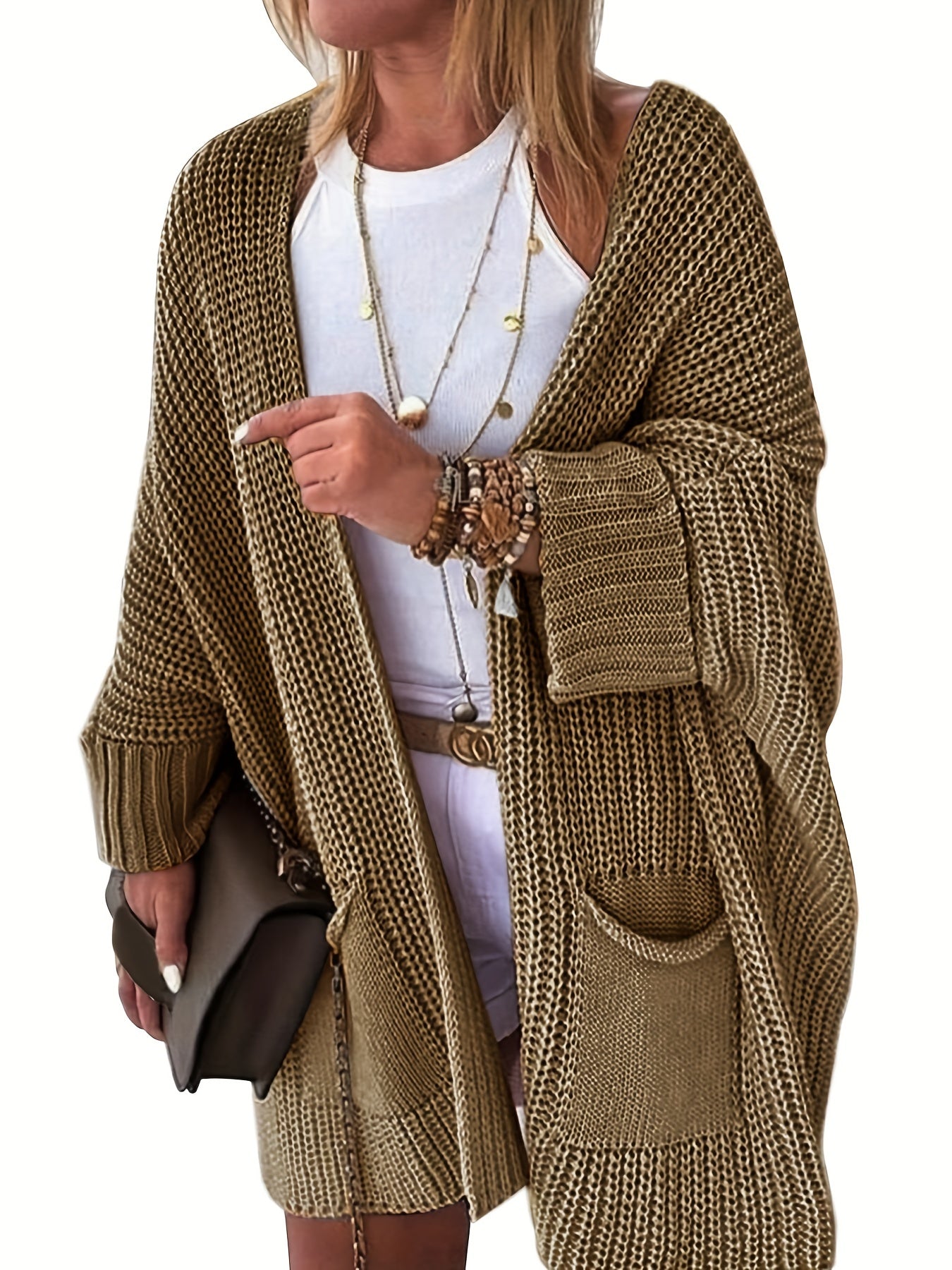 Stay warm and stylish this fall and winter with an elegant mid-length knit cardigan featuring convenient pockets.