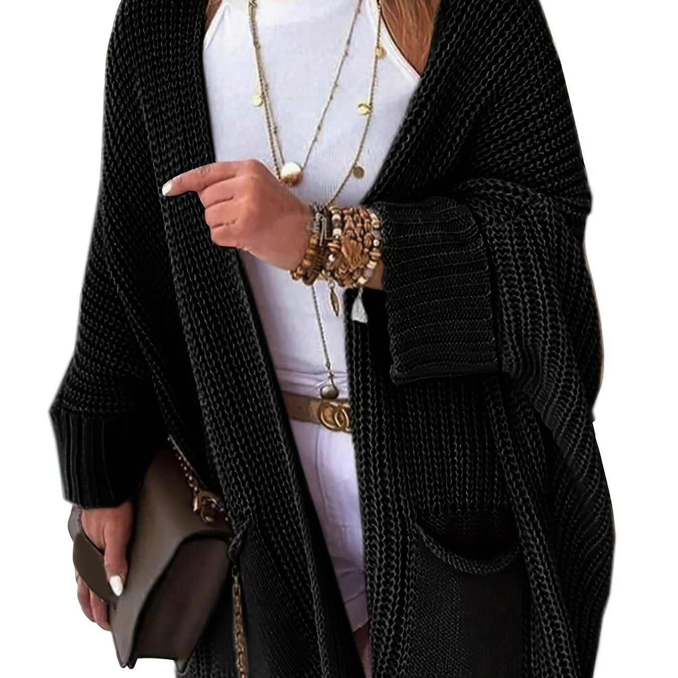 Stay warm and stylish this fall and winter with an elegant mid-length knit cardigan featuring convenient pockets.