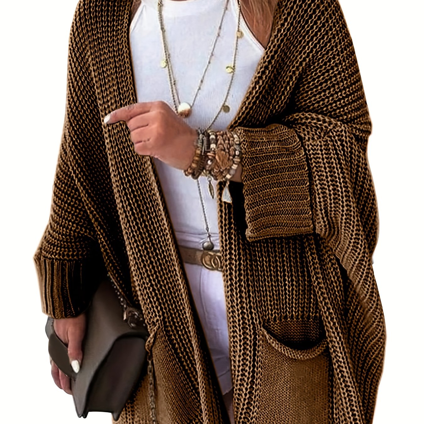 Stay warm and stylish this fall and winter with an elegant mid-length knit cardigan featuring convenient pockets.